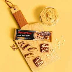 PowerBar PB PROTEIN 40% CRISP LS CARAM PEANUTBUTTER (40GX12) PACKAGE - Energieriegel^ Verpflegung